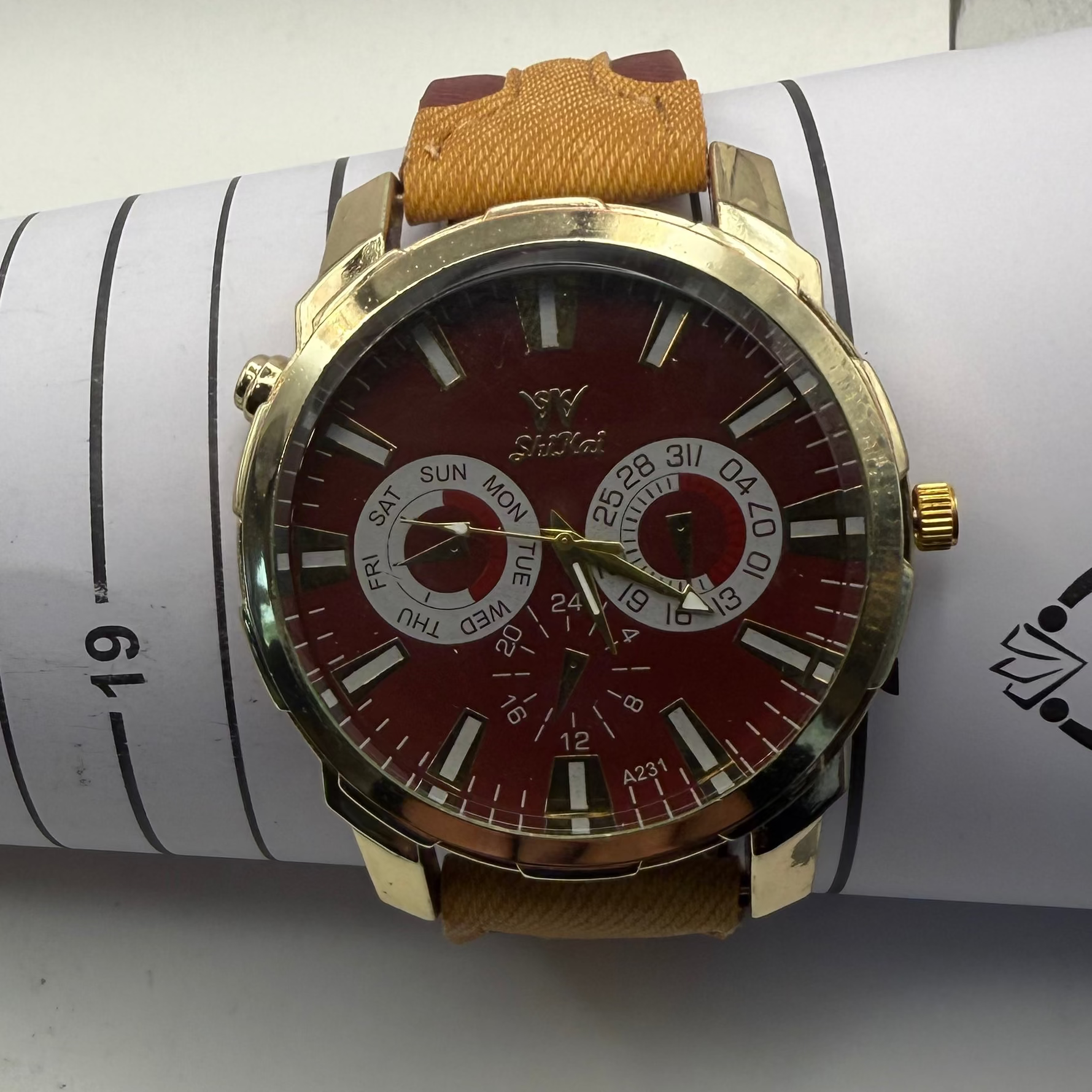 Shhors Multi-Function Red Dial Gold Tone Watch- £15.00