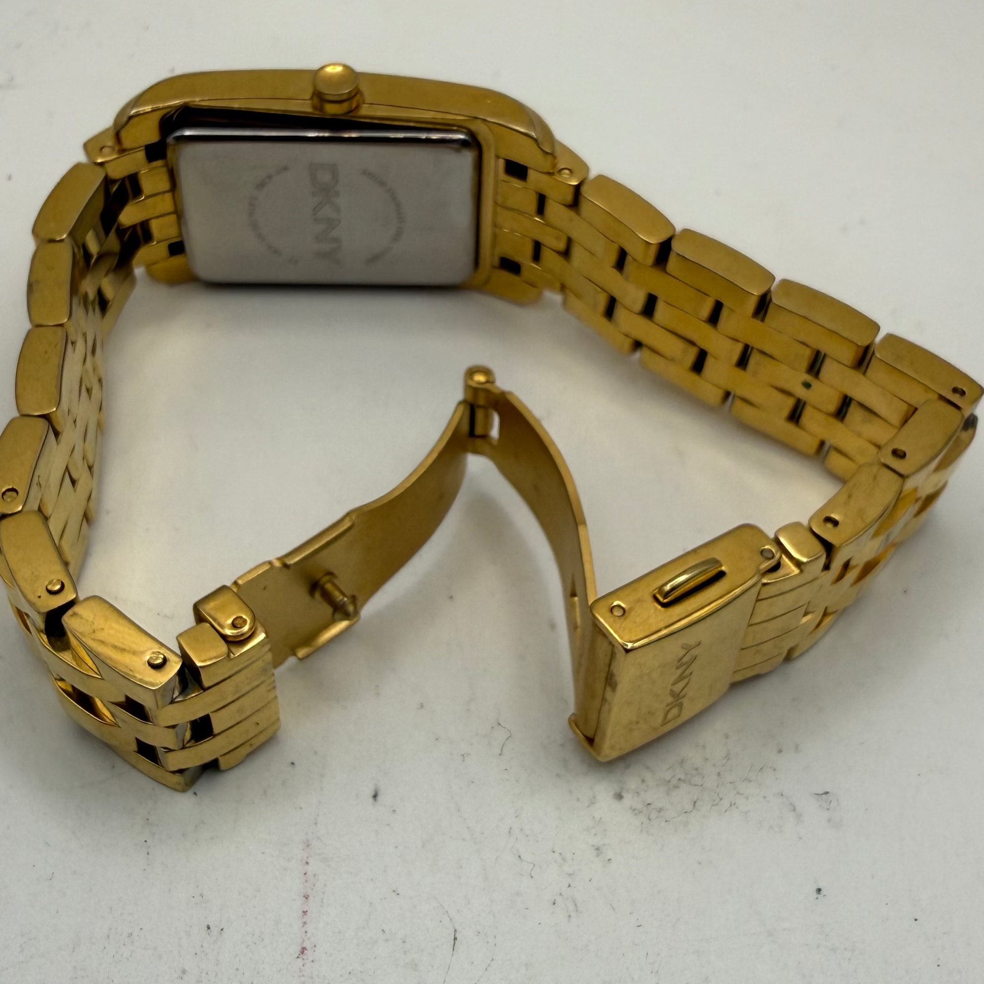 DKNY Ladies Gold Tone Rectangular Quartz Watch (Fully Tested and Working- £30.00