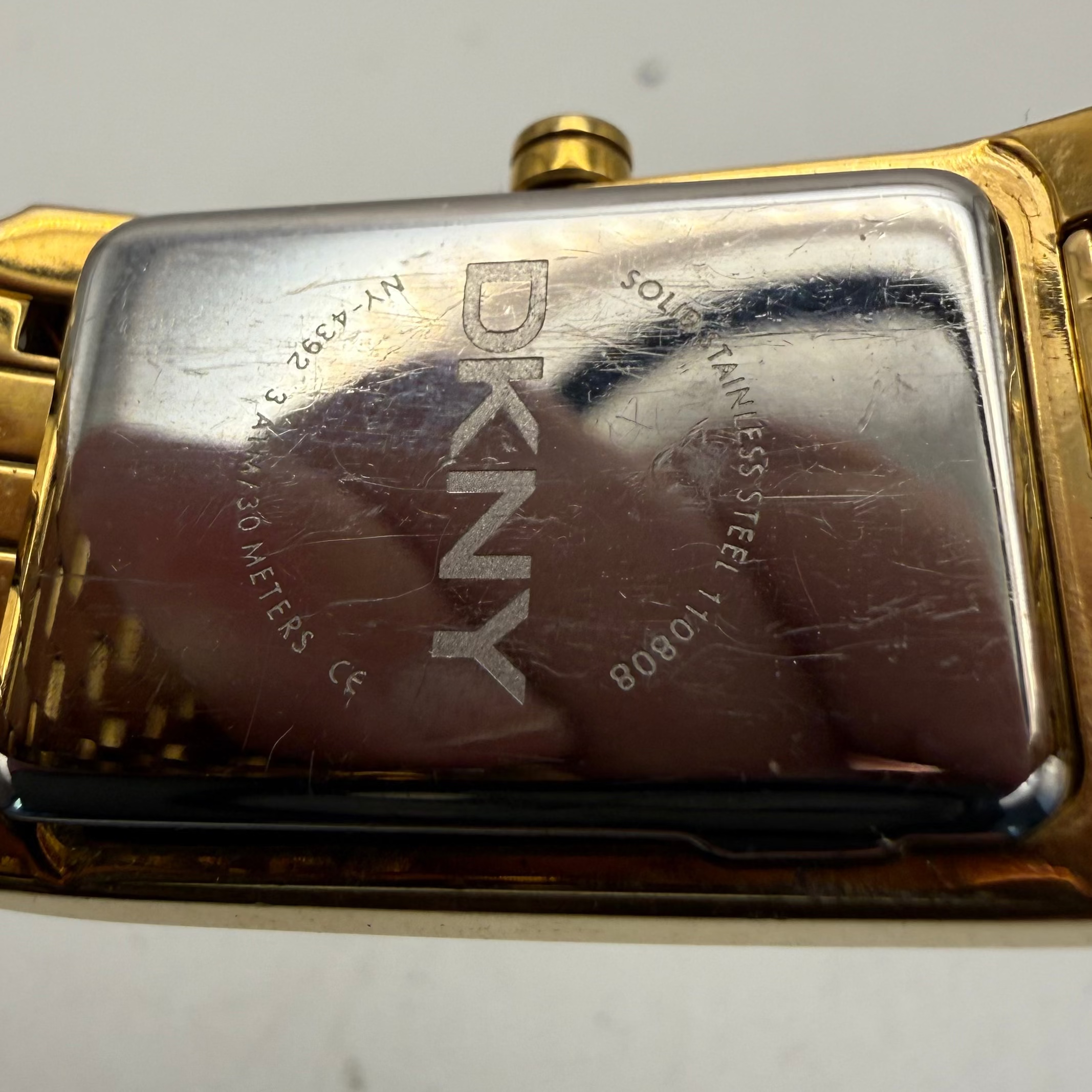 DKNY Ladies Gold Tone Rectangular Quartz Watch (Fully Tested and Working- £30.00