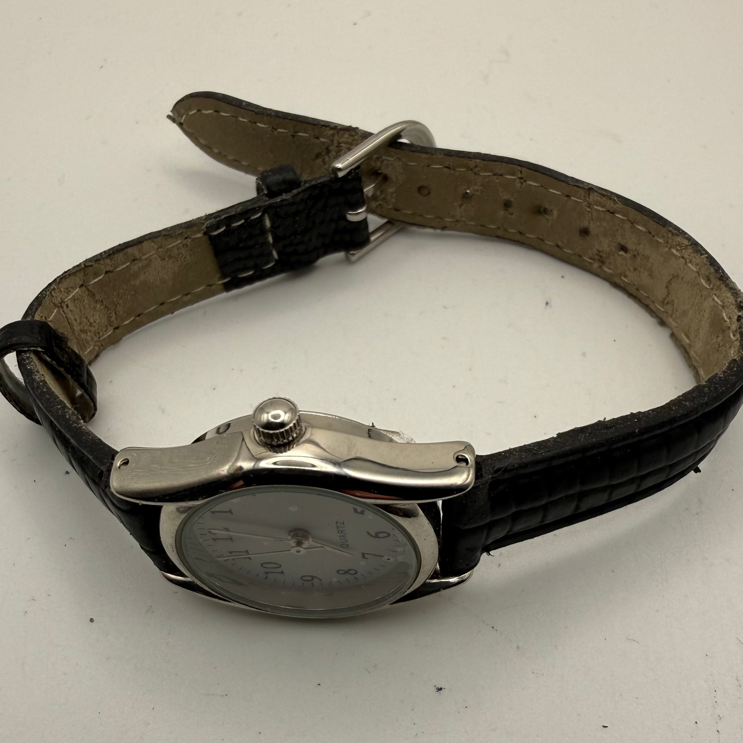 Sargent ladies fashion watch with a clean white dial,- £7.00