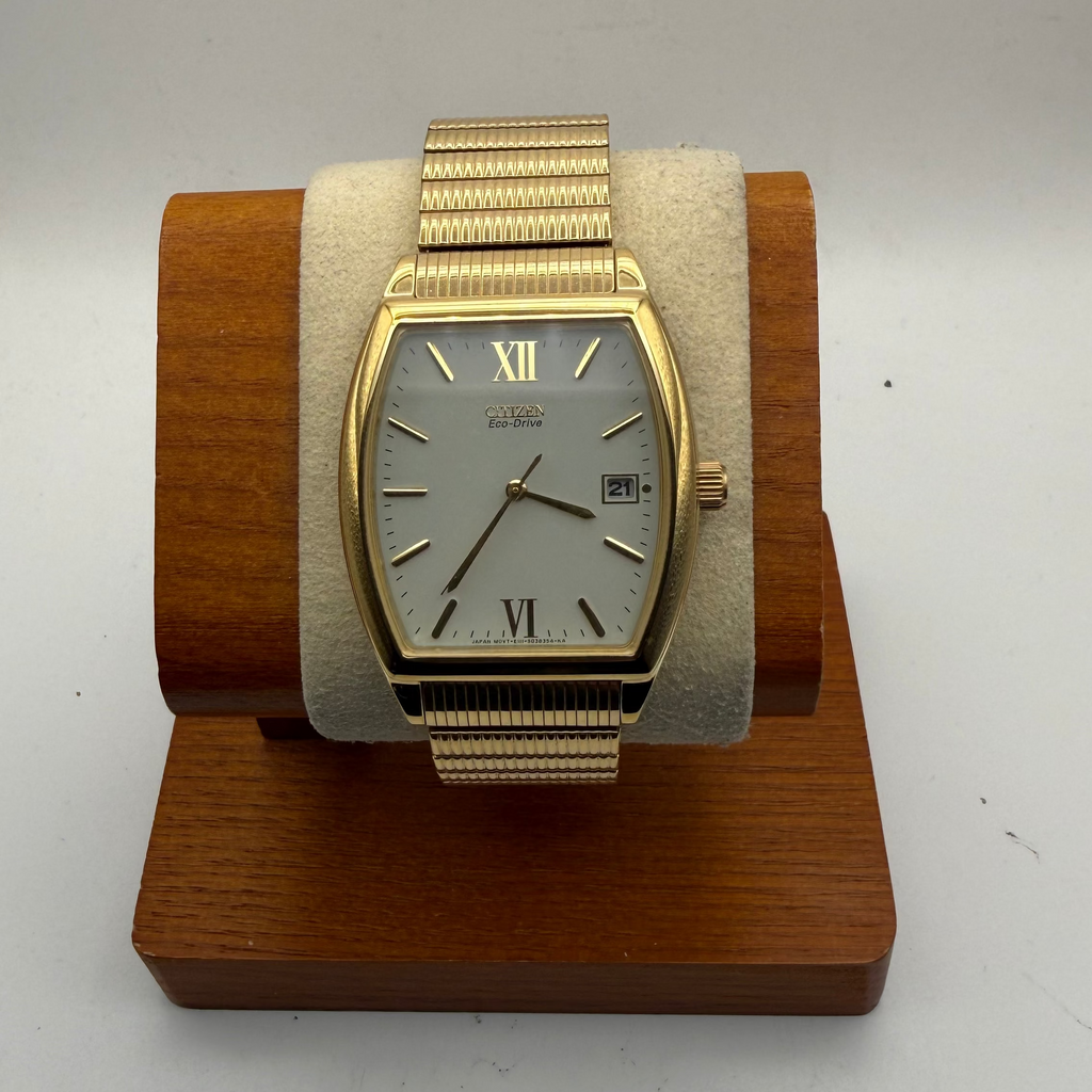 Citizen Eco-Drive E111-S038354 Gold Tone Tonneau Date Watch- £90.00