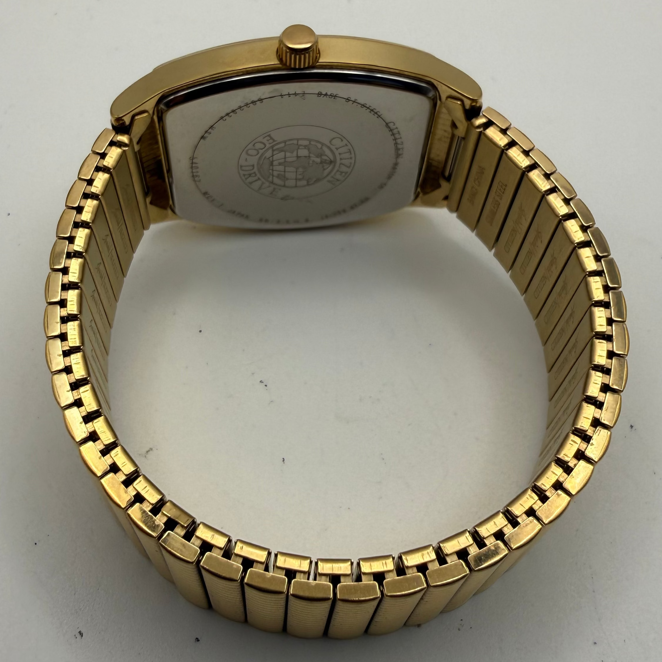 Citizen Eco-Drive E111-S038354 Gold Tone Tonneau Date Watch- £90.00