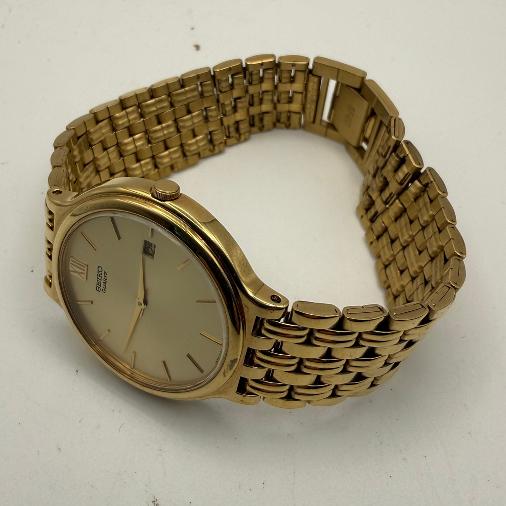 Seiko Quartz Gold Tone Dress Watch 5Y39-7A70 – Champagne Dial- £70.00