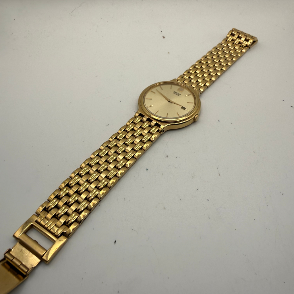 Seiko Quartz Gold Tone Dress Watch 5Y39-7A70 – Champagne Dial- £70.00