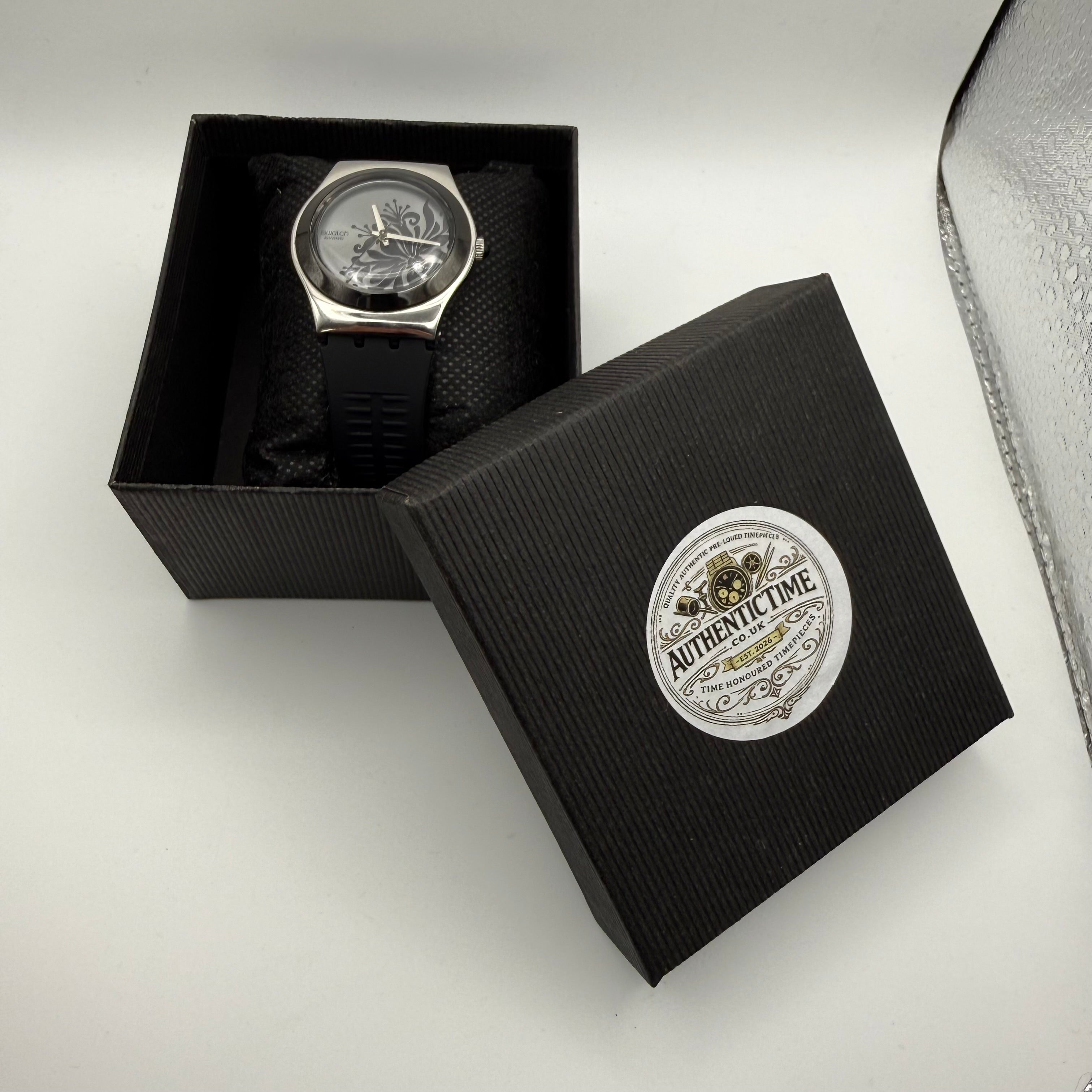 Swatch Irony Stainless Steel – Black Floral Dial - £44.99