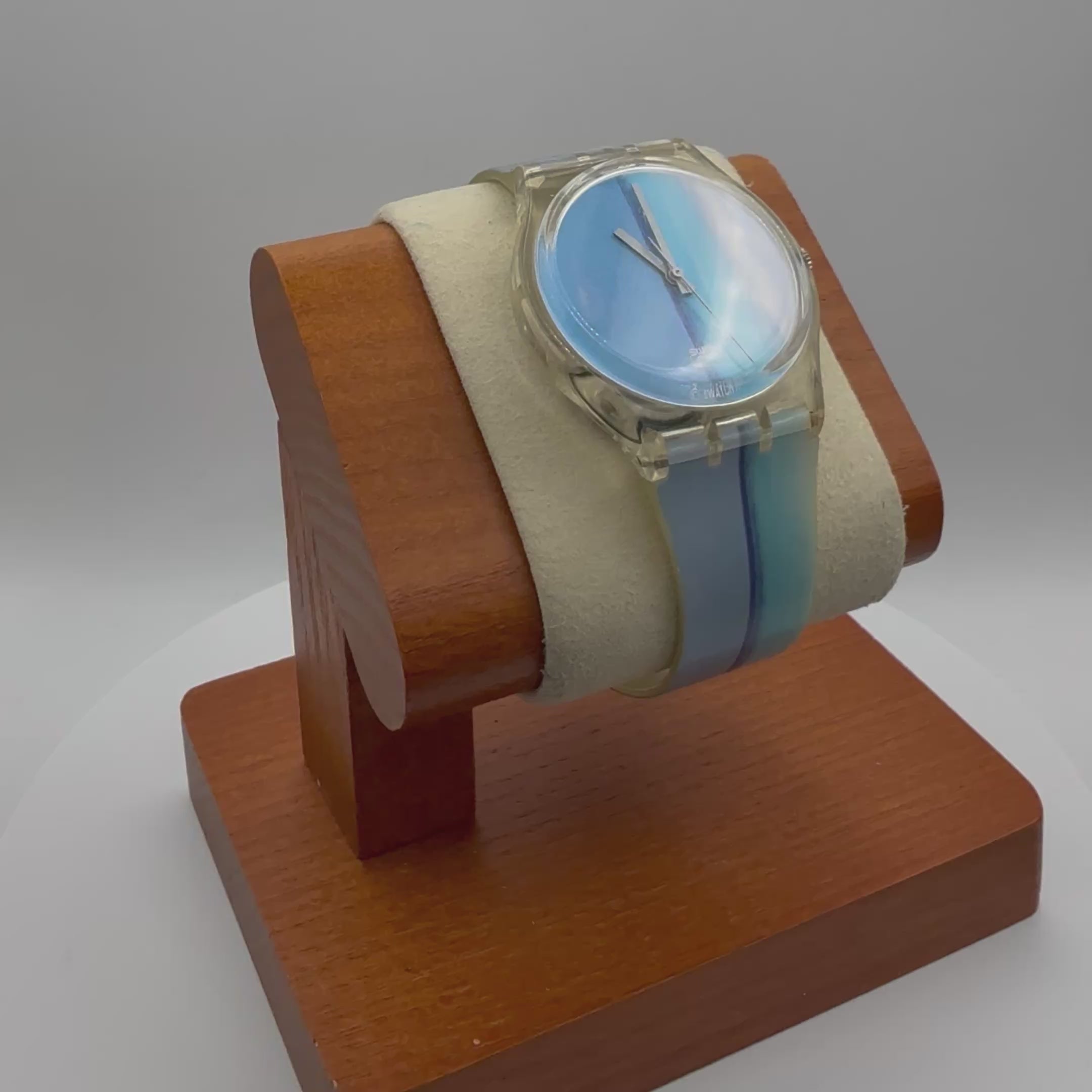 Classic Swatch Quartz Watch featuring a clean minimalist dial with blue gradient stripe- £28.99